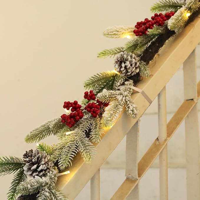 Bdor 6FT Pre-Lit Christmas Garland with Lights – Snow Flocked Pine Garland with Red Berries and Pinecones – Battery Operated Holiday Decoration for Mantel, Staircase, Fireplace, and Front Door